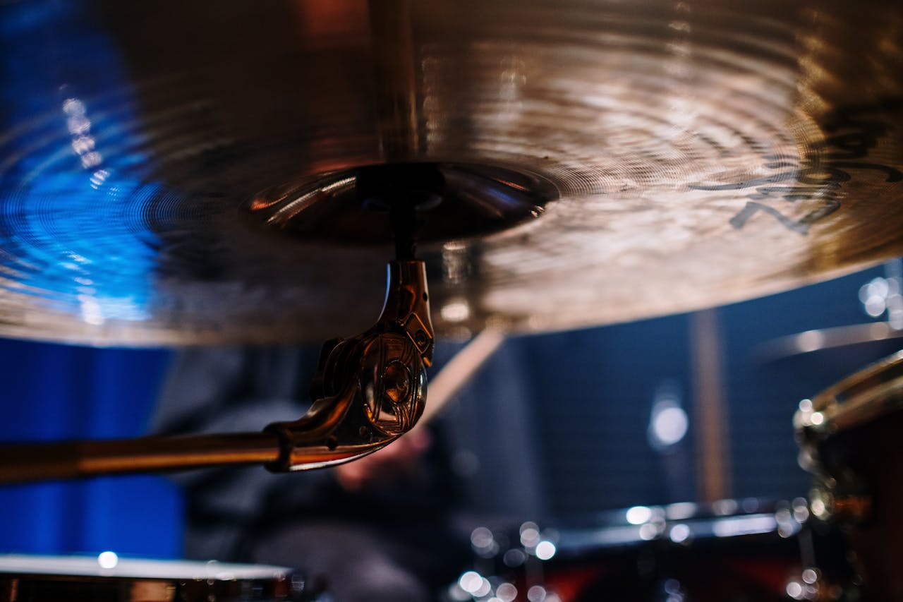 A detailed close-up of a cymbal in a studio, capturing its texture beautifully.